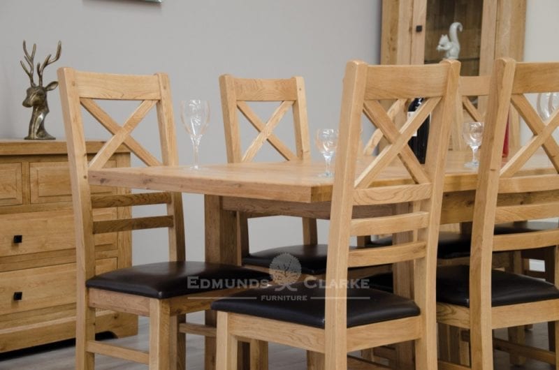 deluxe chunky rustic solid oak dining table 150 cm Rectangular with two leaves that store underneath will sit four to eight people comfortably DLX1500EXT