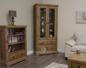 Melford deluxe solid oak glass display cabinet deluxe chunky rustic solid oak glass display unit with two drawers and two glass doors with four toughened glass shelves and choice of knobs DLXGDC
