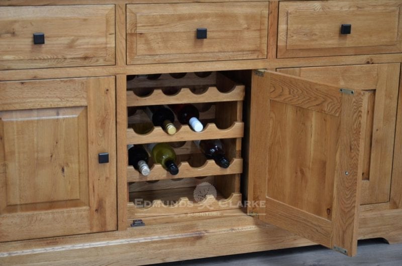 Deluxe Rustic Solid Oak large sideboard with three drawers three doors wine rack inside middle cupboards DLXLSB