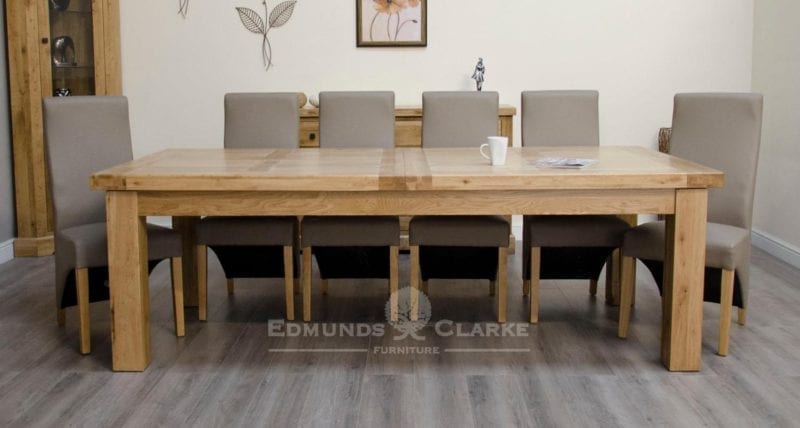 Melford Solid Oak 240cm Extending Dining Table. chunky, two leaves that store underneath will sit 8 to 12 people comfortably DLX2400EXT
