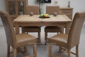 Bury Solid Oak Extending Dining Table- Twin Leaf that stores away under the table. veneered centre panels. square shaker legs