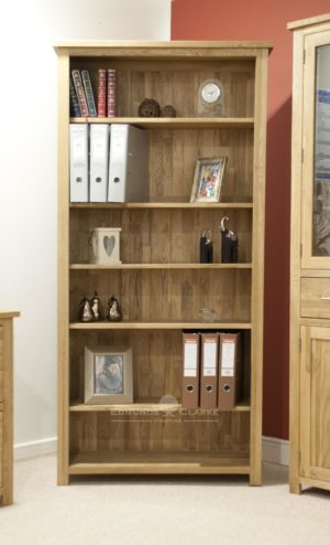 Bury large oak bookcase, four adjustable oak shelves and 1 fixed shelf for support. solid square feet