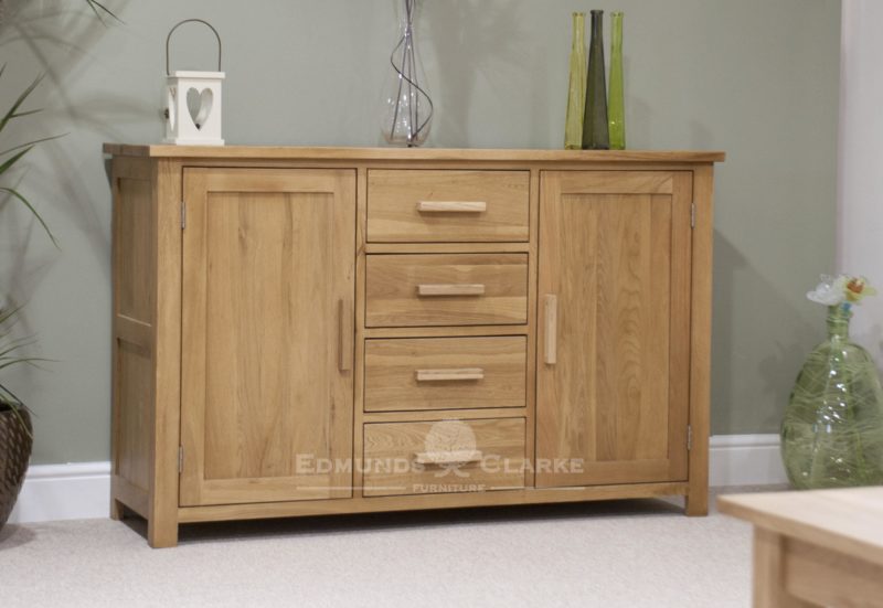 Bury Large Oak Sideboard, 4 centre drawers and cupboard either side. chrome handles as standard, Oak bar handles available as extra