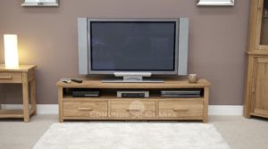 Bury solid oak tv unit - extra wide . 3 handy drawers and space under for media units