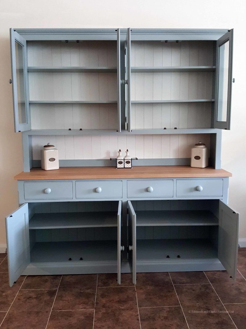 Edmunds 6'6 Painted Half Glazed Dresser. with contrasting white backboards. sideboard has square oak top with 4 drawers and 4 doors. painted knobs and all adjustable shelves. choice of handles and knobs. Image showing doors open.EDM030