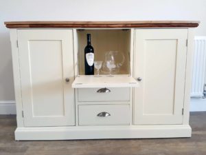 Edmunds painted drinks cabinet sideboard. Moulded oak top, centre drop down door and drawers under and 2 doors either side. choice of handles. EDM039