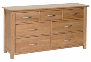 Norwich Oak 3+4 combination Chest. contemporary shaker style straight lines and shaped edges on tops. shaped chrome bar handles. 7 handy drawers. 3 small and 4 large drawers NNC90