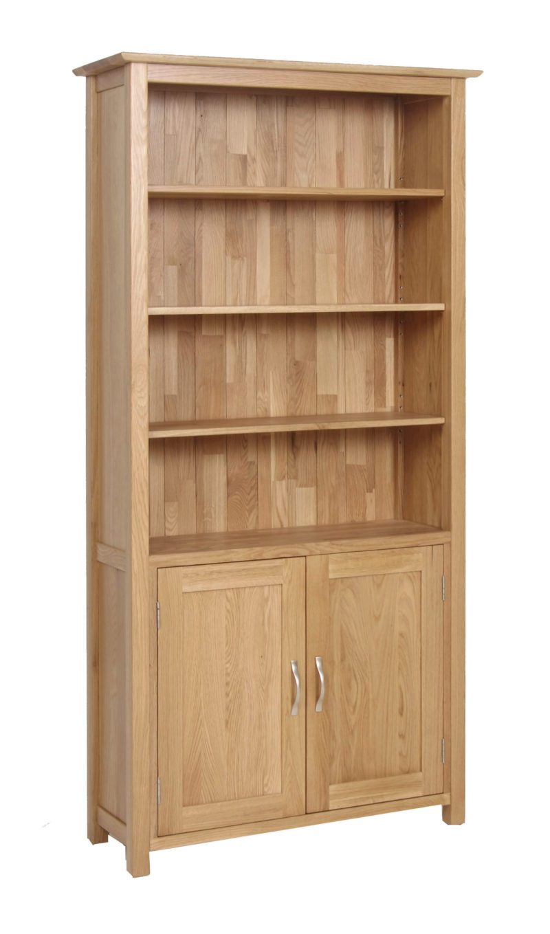 Norwich Oak Bookcase Cupboard. Contemporary shaker style straight lines and shaped edges on tops. shaped chrome bar handles.3 adjustable shelves and 1 fixed. 2 handy doors with 1 adjustable shelf. NNO55