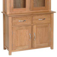Norwich Oak 3ft Dresser Base. Contemporary shaker style with clean lines. moulded top. chrome shaped bar handle. 1 adjustable shelf inside cupboards and two handy drawers above. Sits with Norwich oak 3ft dresser top. NNS20