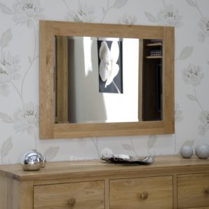 solid oak wall mirror 102cm x 72cm. bevelled glass mirror in a solid oak frame