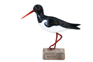 Archipelago Oyster Catcher Wood Carving D208. Black and white carving with red beak and legs sitting on an aged wood block. hand carved and painted. Fairtrade