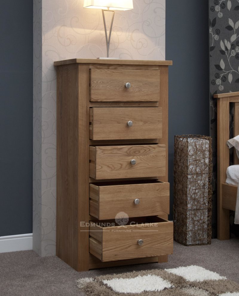solid oak tall narrow five drawer chest, good sized drawers with chrome tapered knobs