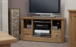 solid oak corner tv stand with drawer and open space above either side, open central gap in centre with three adjustable shelves