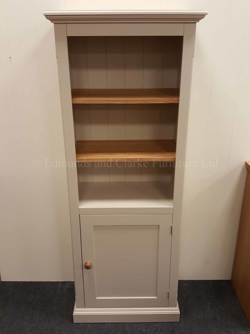 Painted narrow one door bookcase two adjustable shelves with door below