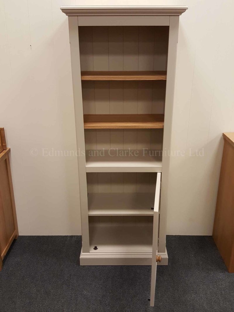 Edmunds painted narrow bookcase with cupboard below