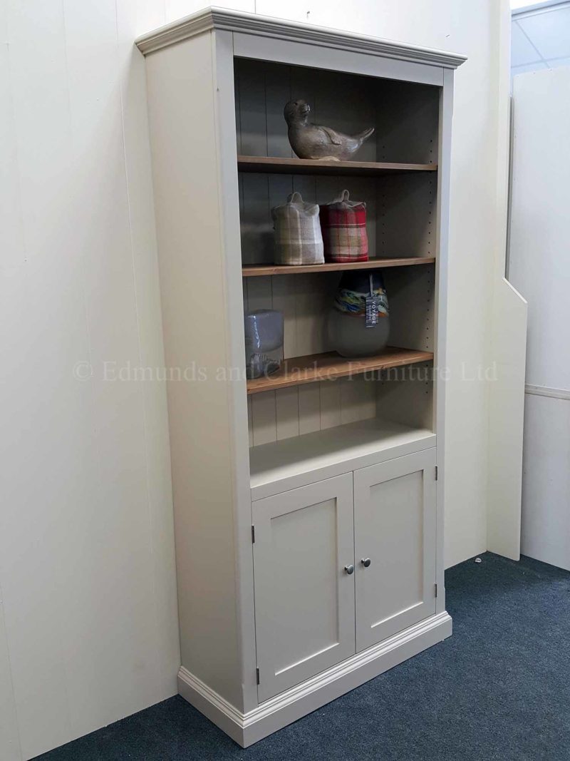 Edmunds painted bookcase with two door cupboard below adjustable shelves above