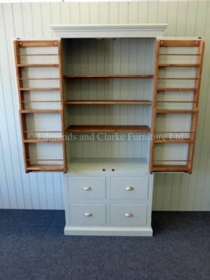 edmunds painted larder cupboard. hidden spice racks on inside of doors. image showing painted all over with pine shelves.4 large deep drawers under. 10 colours to choose from with various handle and knob options to choose from only at edmunds clarke bury st edmunds