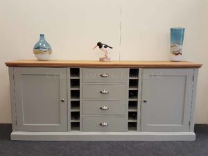 Edmunds Painted 7ft Multi Sideboard. can hold upto 12 bottles of wine. centre drawers with wine rack either side then door either side. hampton moulded top