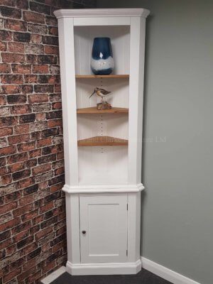 edmunds painted corner cupboard. image showing painted all over with open pine shelves and cupboard underneath. 10 colours to choose from with various handle options only at edmunds clarke bury st edmunds