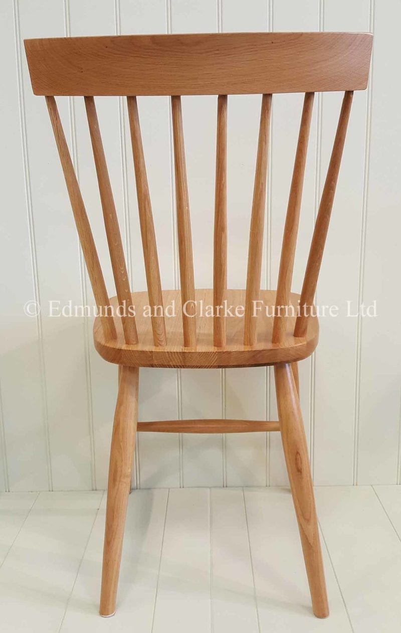 Oak Nordic dining chair made from solid oak turned legs and back rest