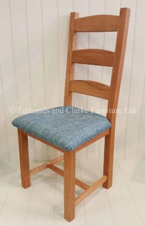 Edmunds Amish Oak dining chair with choice of seat pads. available in light lacquered oak or oiled oak finish. three wide horizontal slats on the back. available only at Edmunds and clarke bury st edmunds