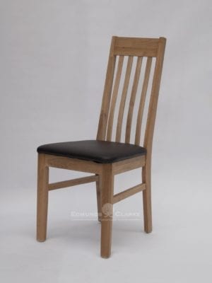 Sophia oak dining chair. slatted back with small lumbar support and faux leather seat bad in brown