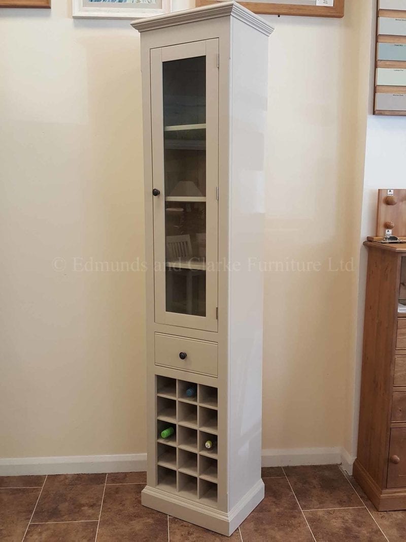 Tall narrow glazed kitchen cupboard with wine rack