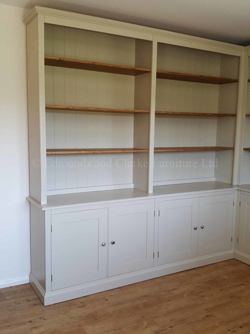 Library bookcase made to measure to fit a corner, painted with wooden adjustable shelves