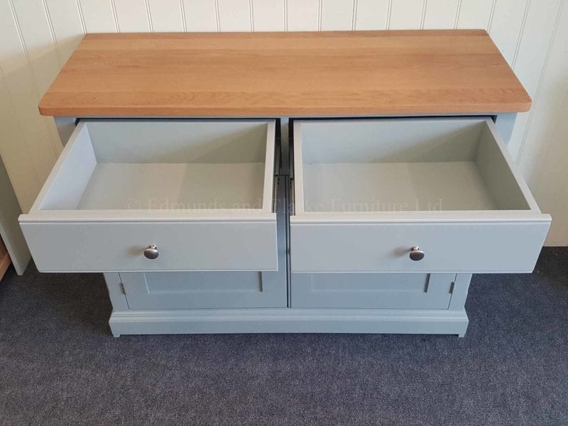Full extension drawer runners fitted to two drawer sideboard painted with oiled square edge top