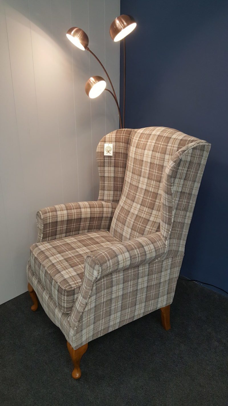 Fabric wing chair in a check fabric . Many fabrics to choose from