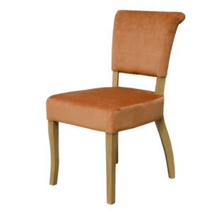 Capri velvet dining chair in burnt orange and oak legs