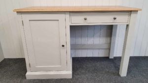 Single pedestal office desk with single cupboard and drawer above kneeholeboard