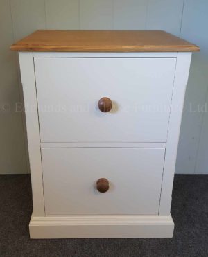 two drawer filing cabinet painted white withwaxed pine top and knobs