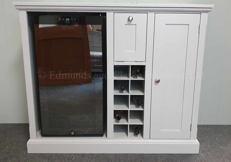 drinks sideboard painted grey all over, wine cooler on left central wine rack holding 10 bottles with glass storage above, cupboard with 2 shelves on right