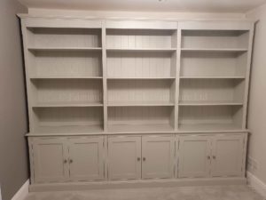 Painted 6 door wide bookcase with cupboards below painted pavilion grey all over