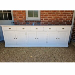 EDMSB9 Edmunds 5 Drawer Sideboard painted white all over with beaded top. 5 cupboards under. Edmunds & Clarke Furniture