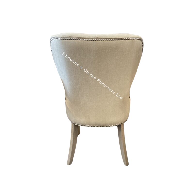 Abbey dining chair stone with studs back view. Edmunds & Clarke Furniture