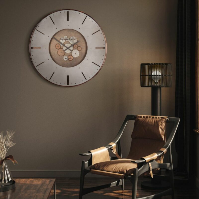 Thomas Kent Clocksmith Wall Clock - Bronze room shot. A large wall clock showing the working mechanisms in the centre