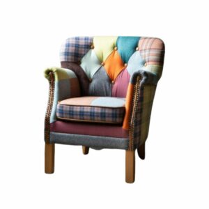 Govenor patchwork armchair no background. Edmunds & Clarke Furniture
